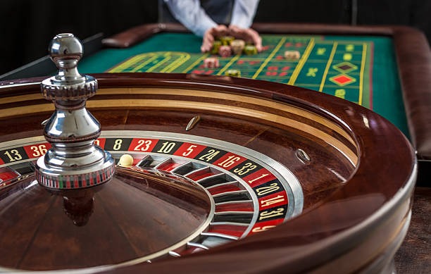 Live casino table with roulette and live dealer
